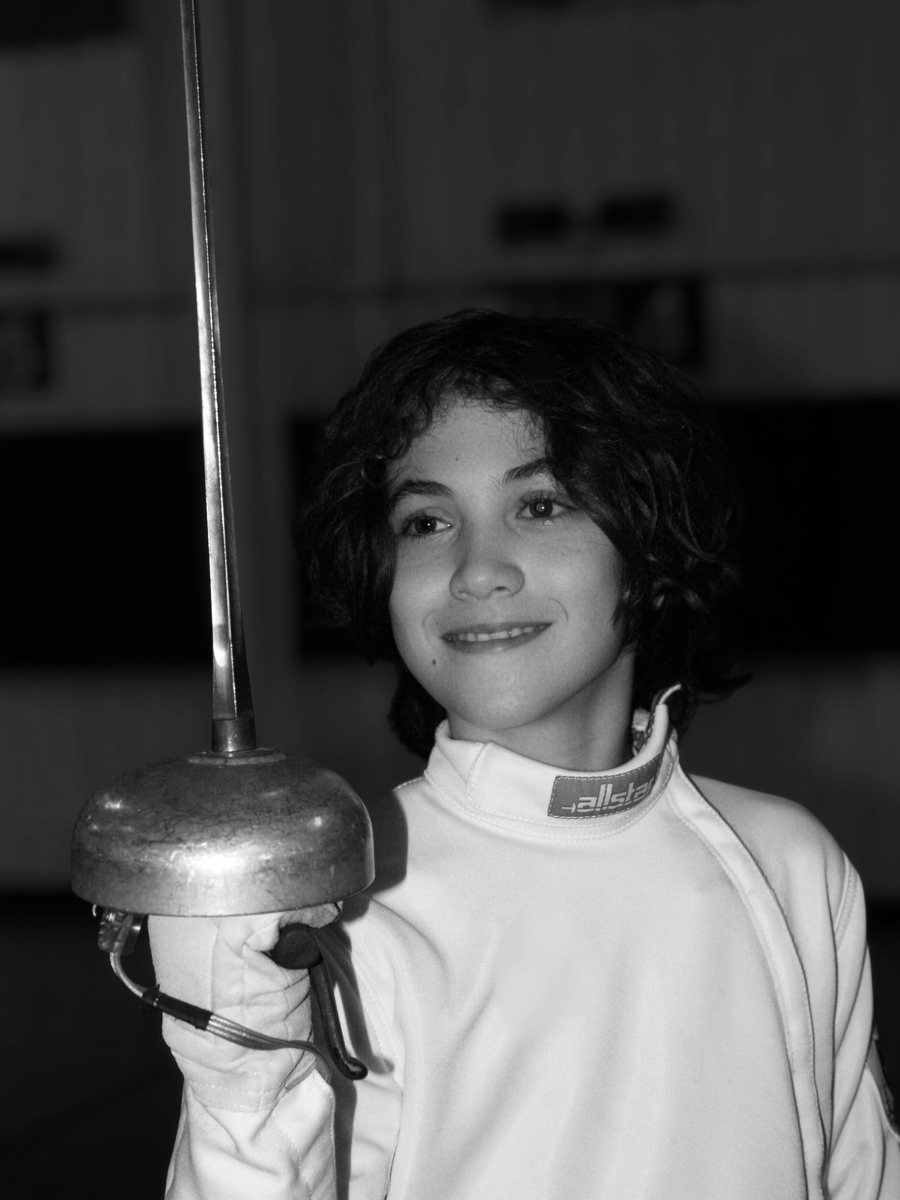 A young fencer at the salle